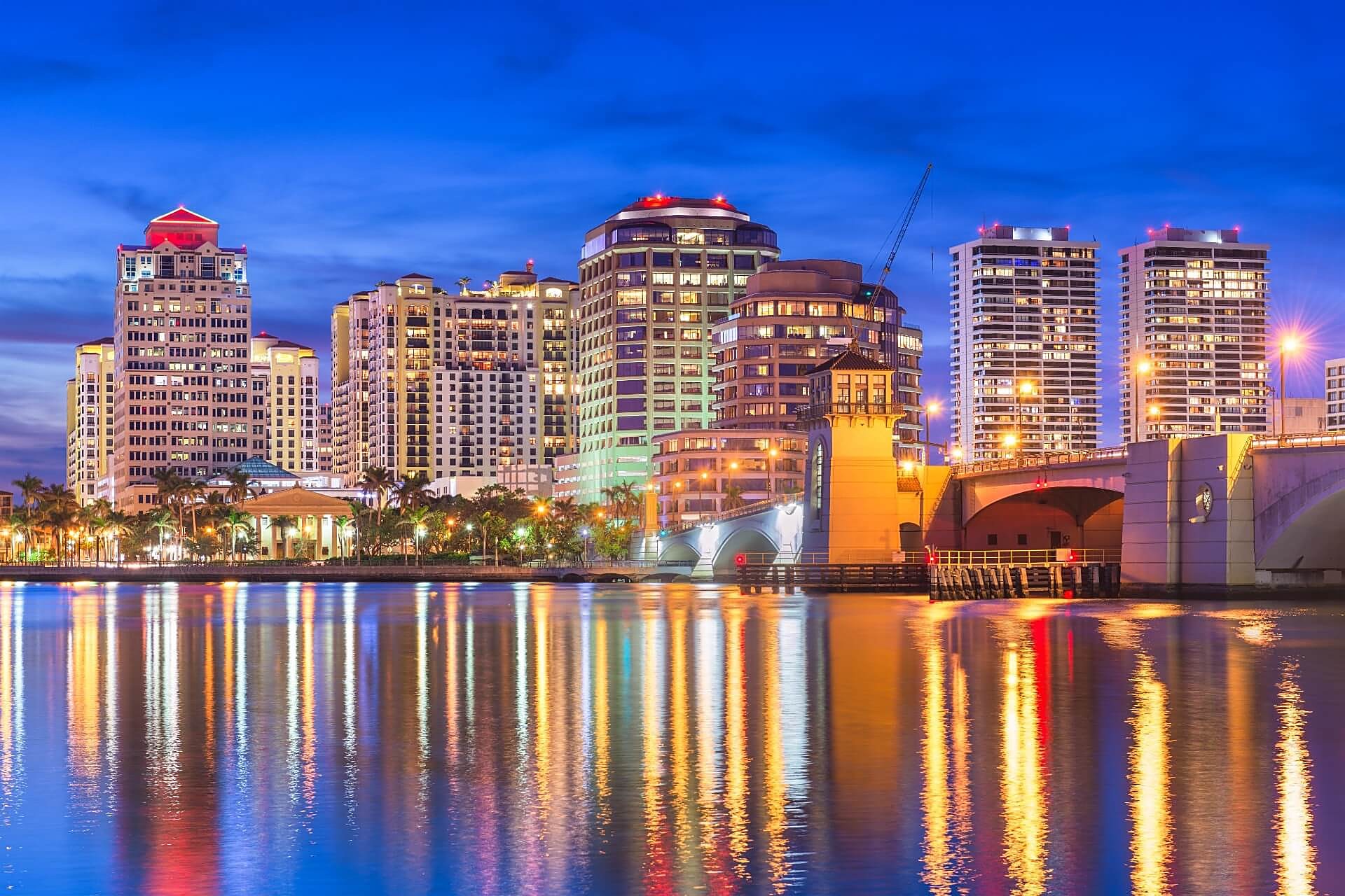 Palm Beach County, Florida skyline and waterfront at dusk